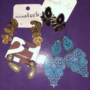 Four pairs of statement earrings